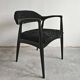 Pair of Mid Century Modern armchairs in astrakhan leather.