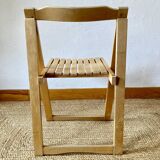 Folding chairs designed by Aldo Jacober in solid beech wood.