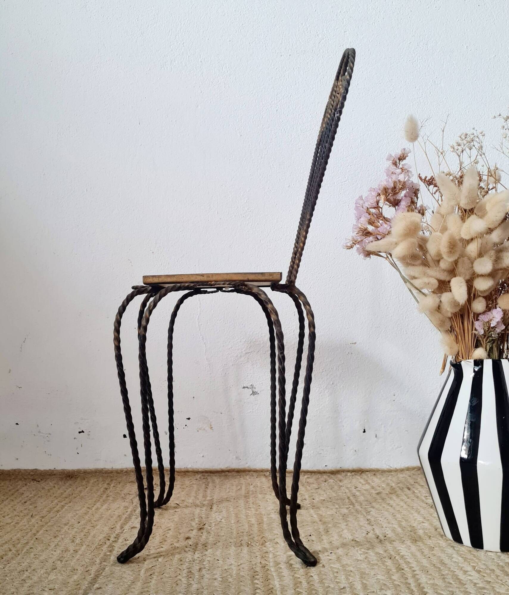 Small chair / stool in twisted wrought iron and floral ceramic.