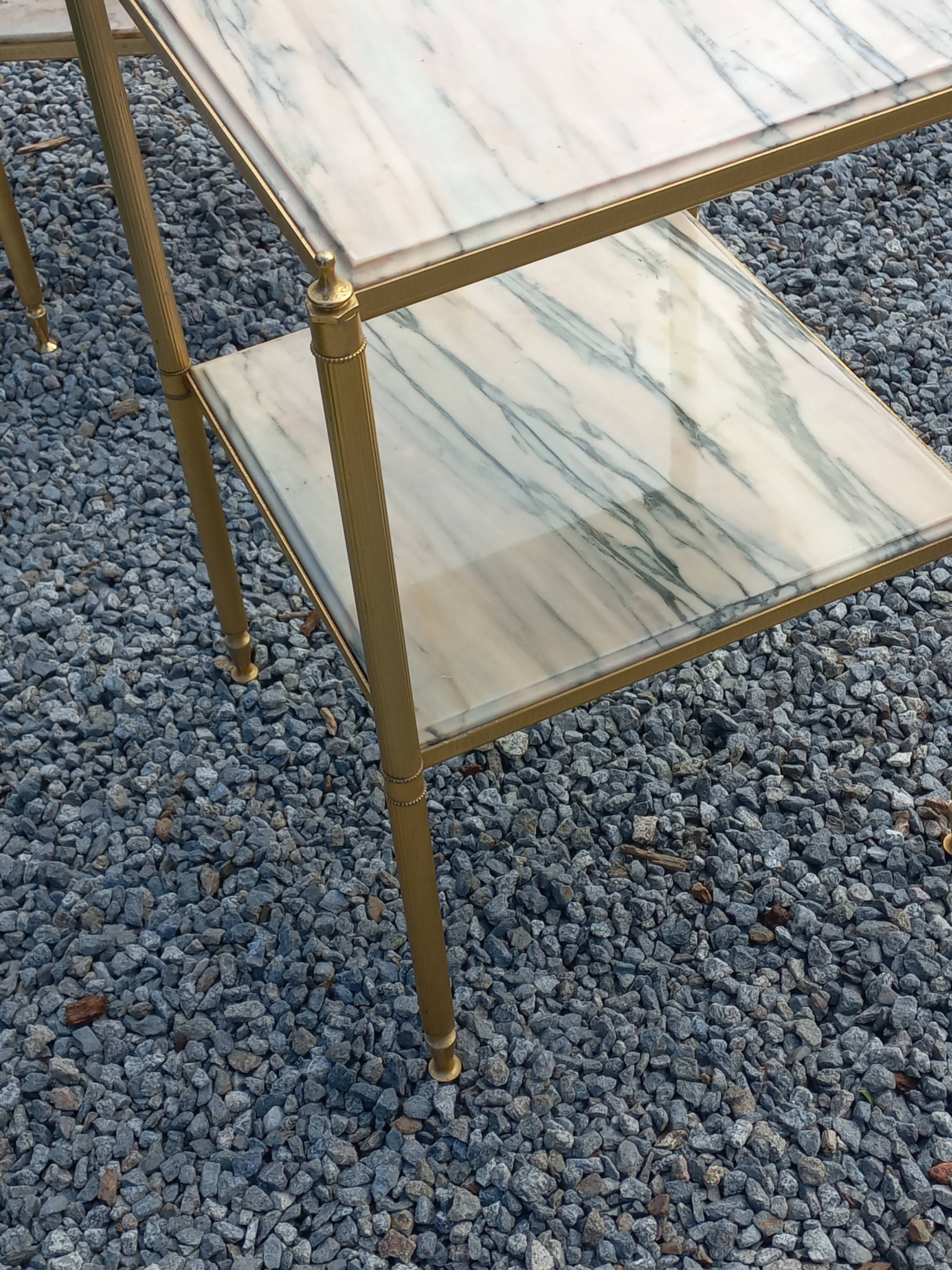 Pair of neoclassical side tables in bronze, brass, marble, and o.