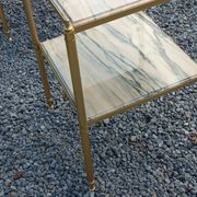 Pair of neoclassical side tables in bronze, brass, marble, and o.