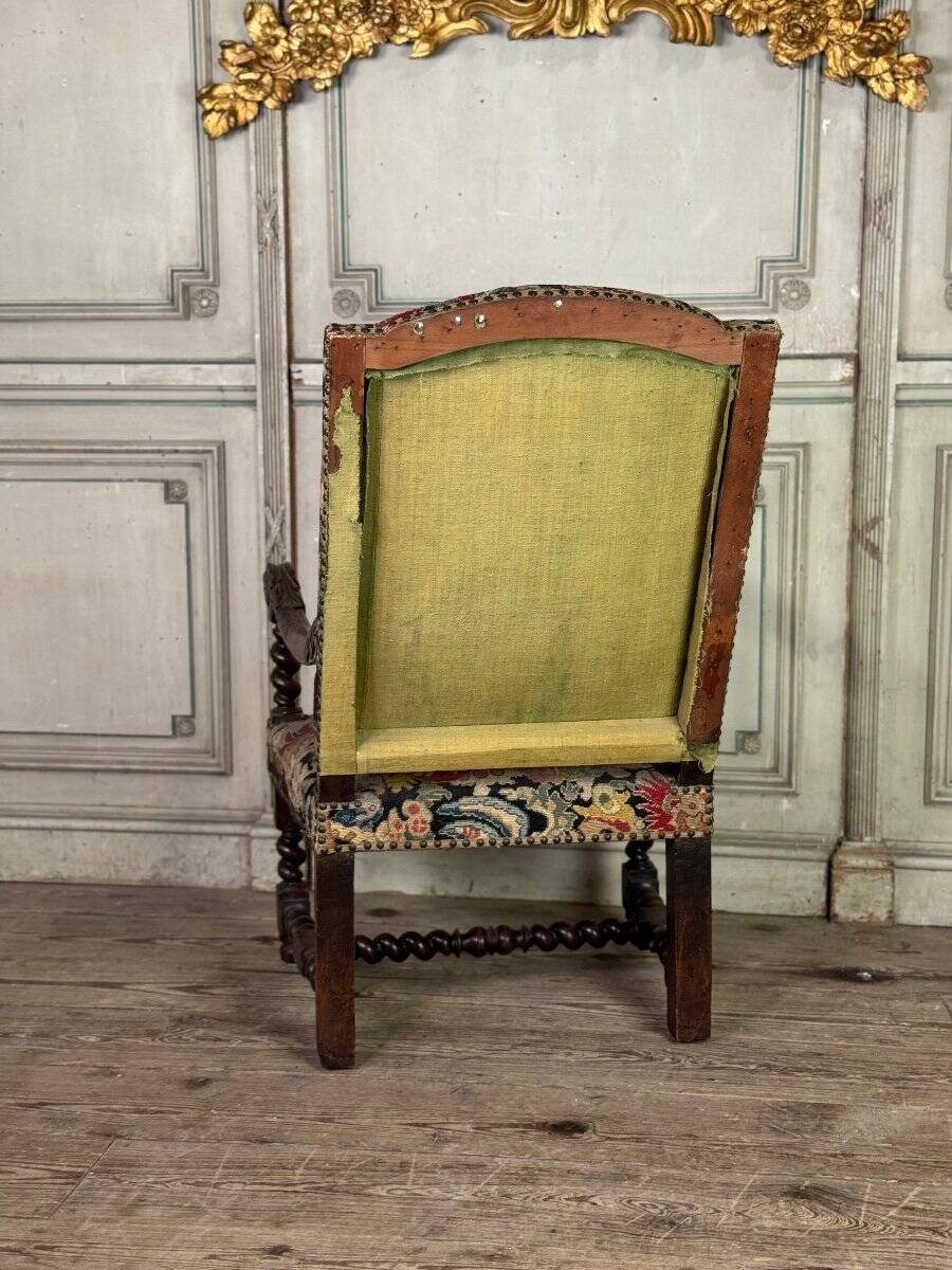 Carved walnut and tapestry armchair, late 17th century