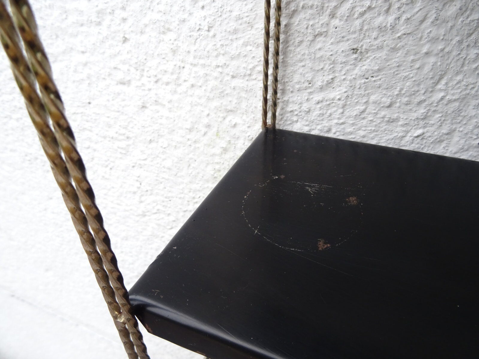 Metal thong wall shelf