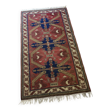 Tapis persan rouge vintage