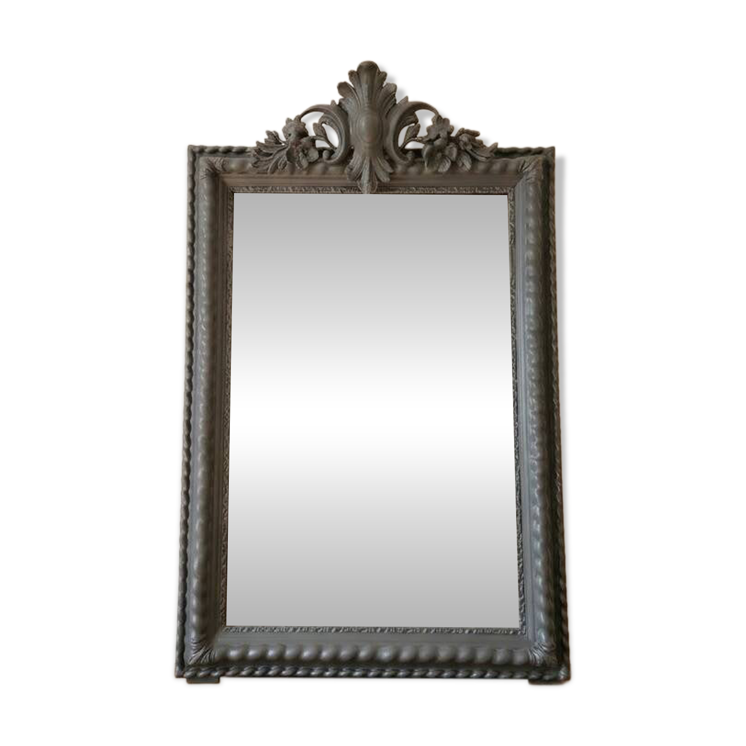 Antique mirror with a sculpted pediment in classic grey style.