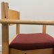 Scandinavian style oak and burgundy chair with armrests