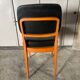 Set of 4 vintage 1960s chairs in wood and black faux leather – design