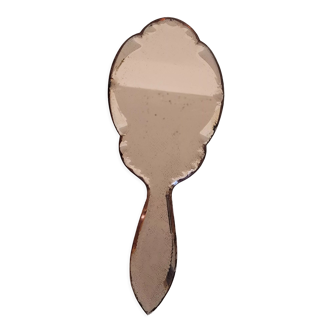 Mirror facing beveled hand