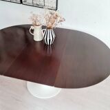 Extendable table with tulip base, round oval wooden top