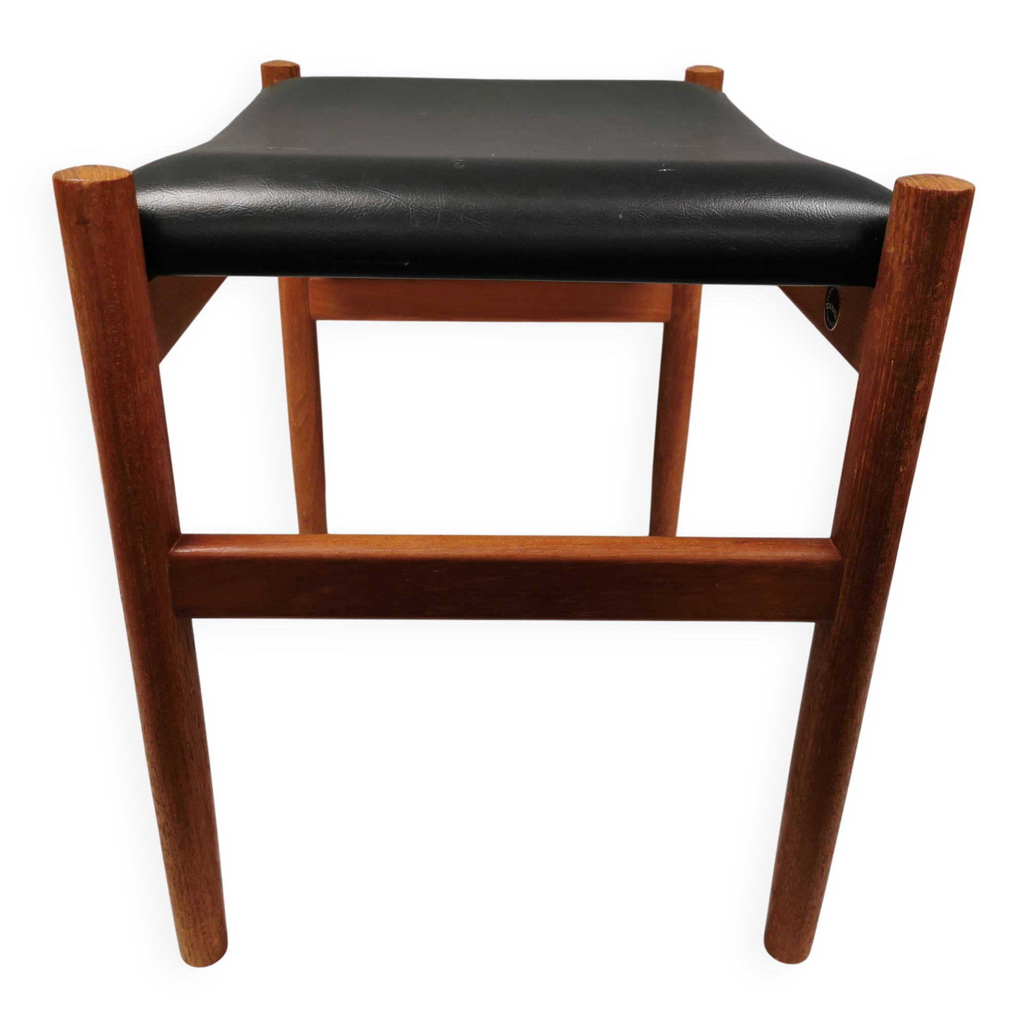 Danish designed footstool in teak wood and black skai “imitation leather”