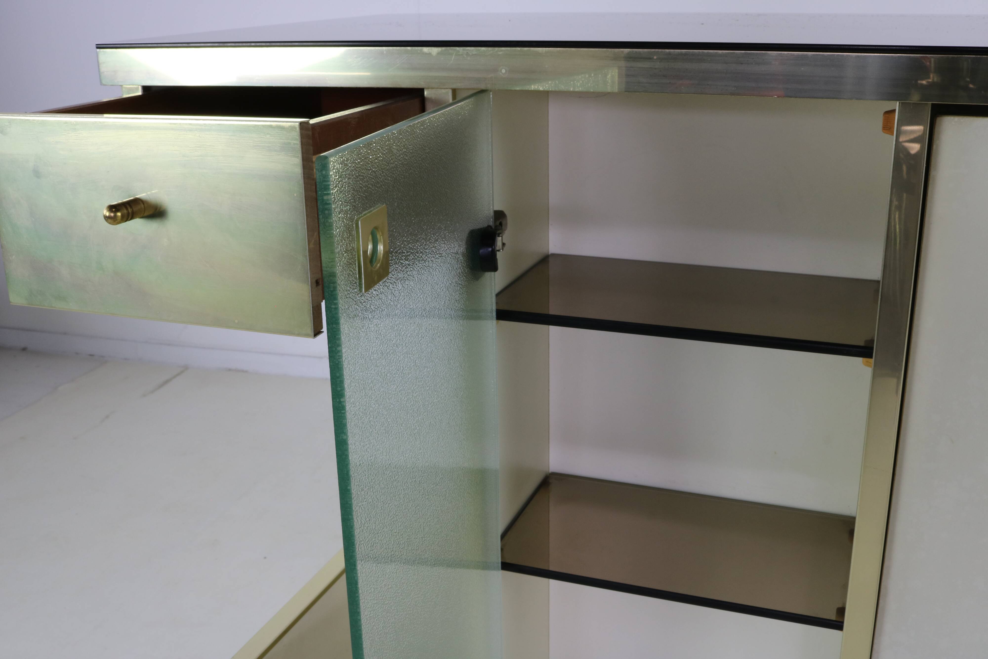 Seventies design bar cabinet by Harvey Guzzini for Stilglass Donati