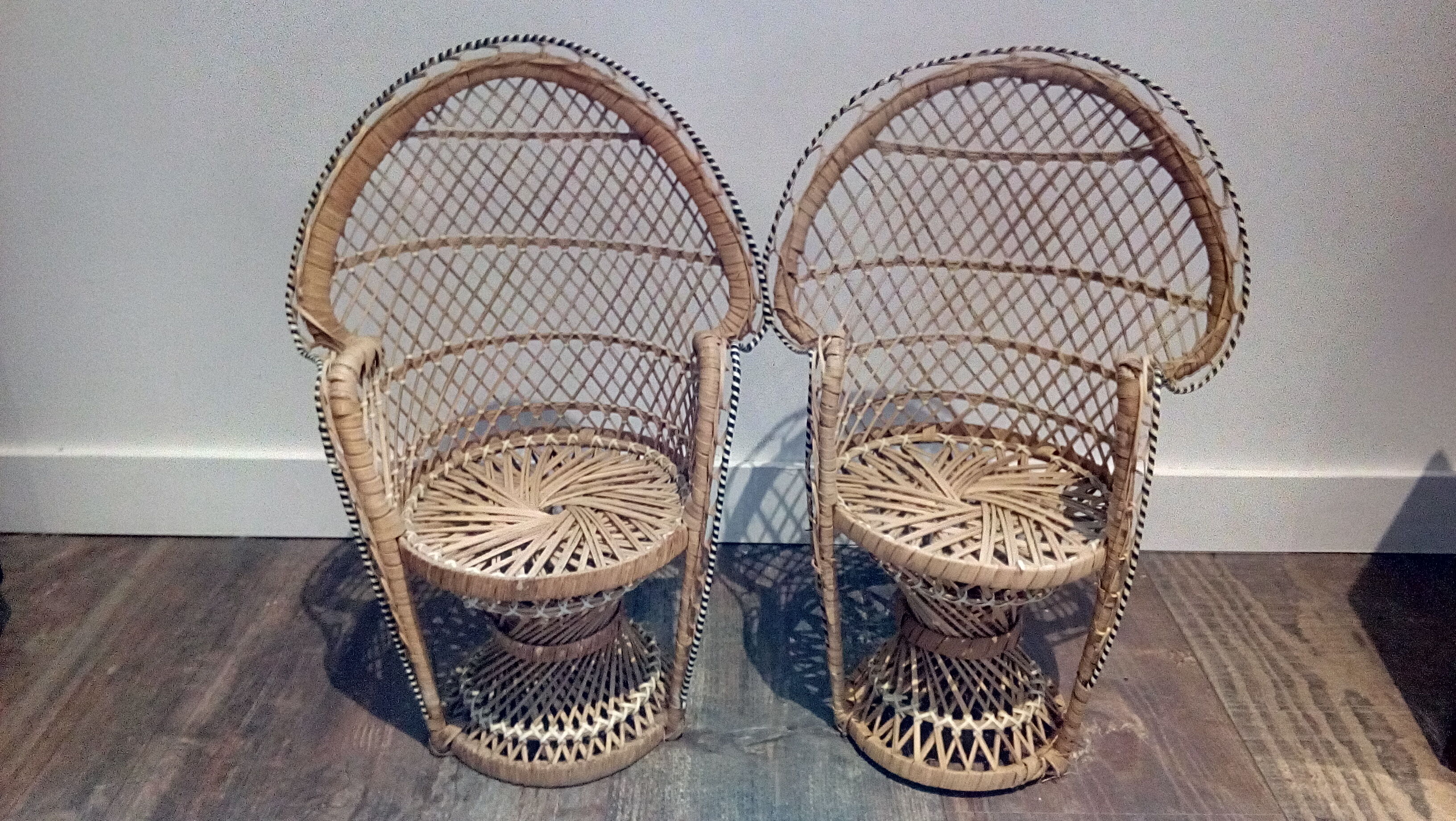 Duo of wicker doll chairs