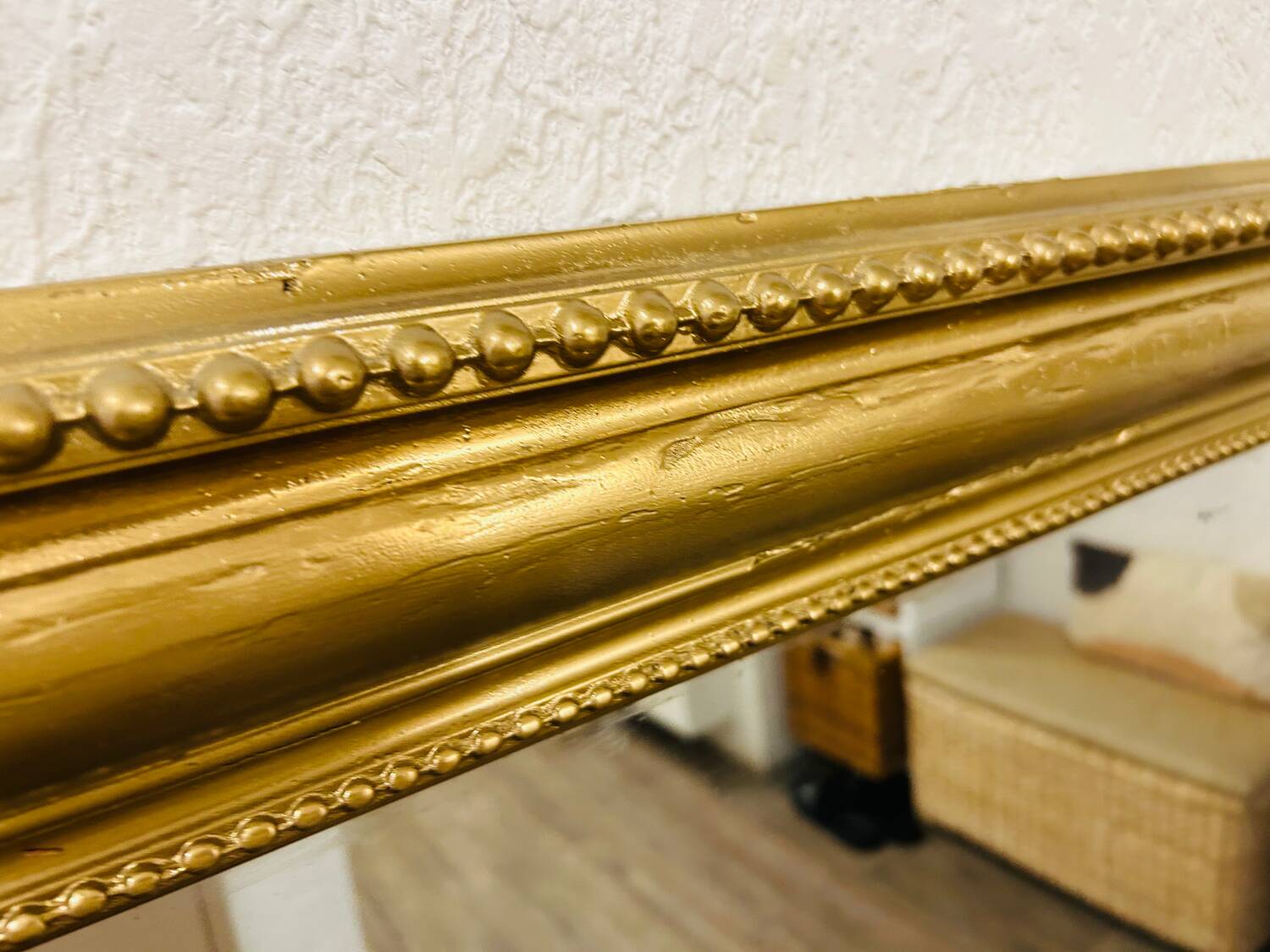 Antique gilded mirror in old Louis Philippe wood