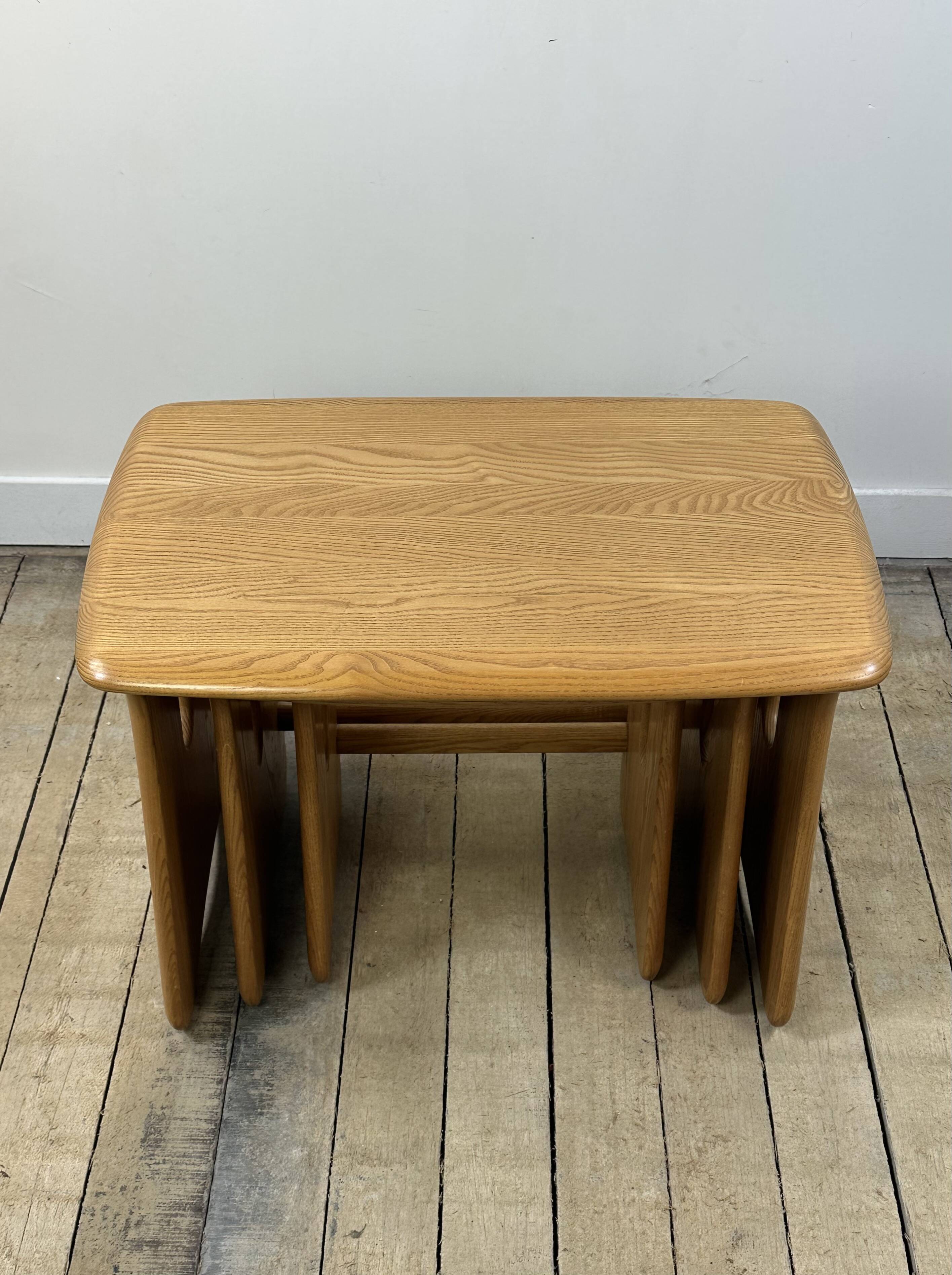 Vintage Ercol nesting tables in solid elm from the 1980s.