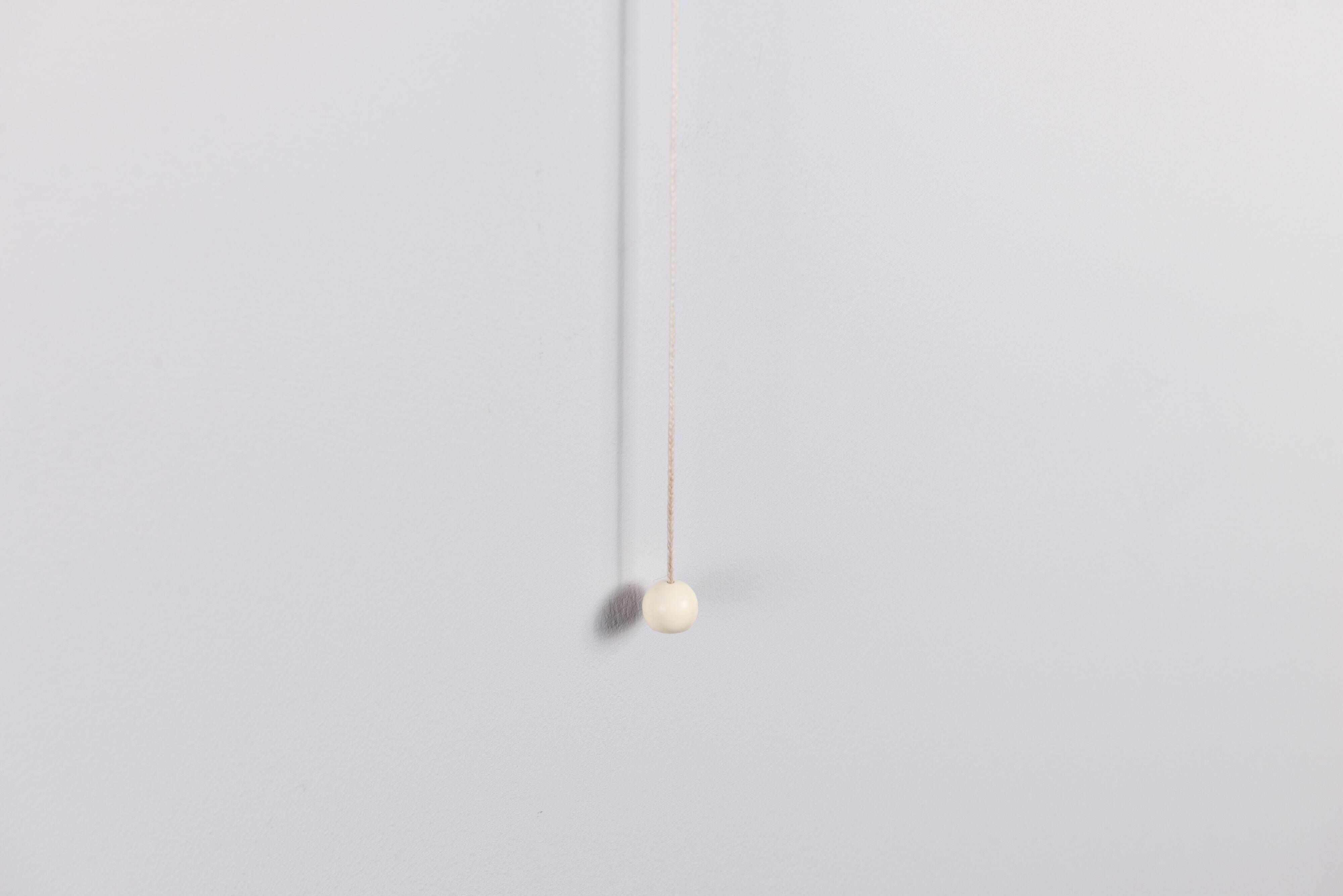 Cilindrical opal glass and bent wood wall lamp