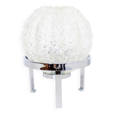 Glass table lamp on a silver base