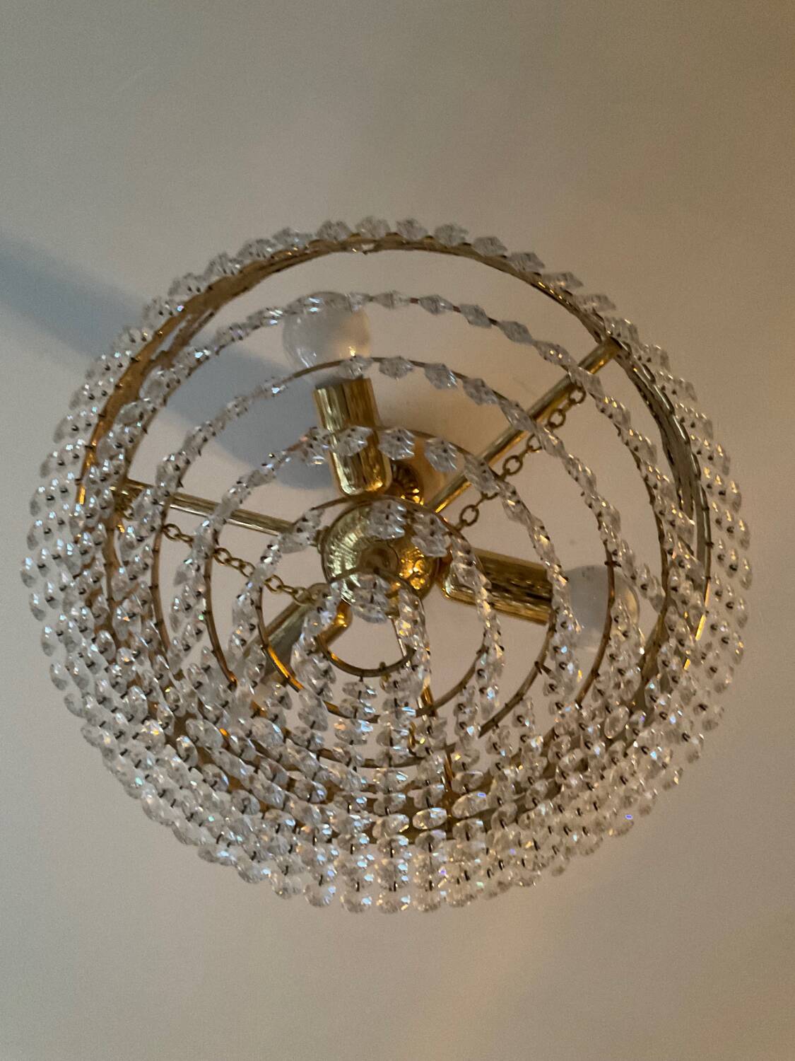 Vintage chandelier cascade of crystal and brass tassels