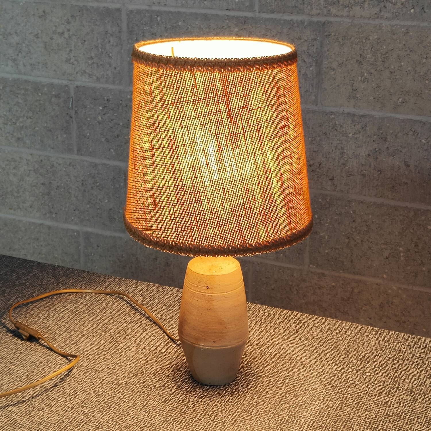 Patinated sandstone and jute ceramic lamp