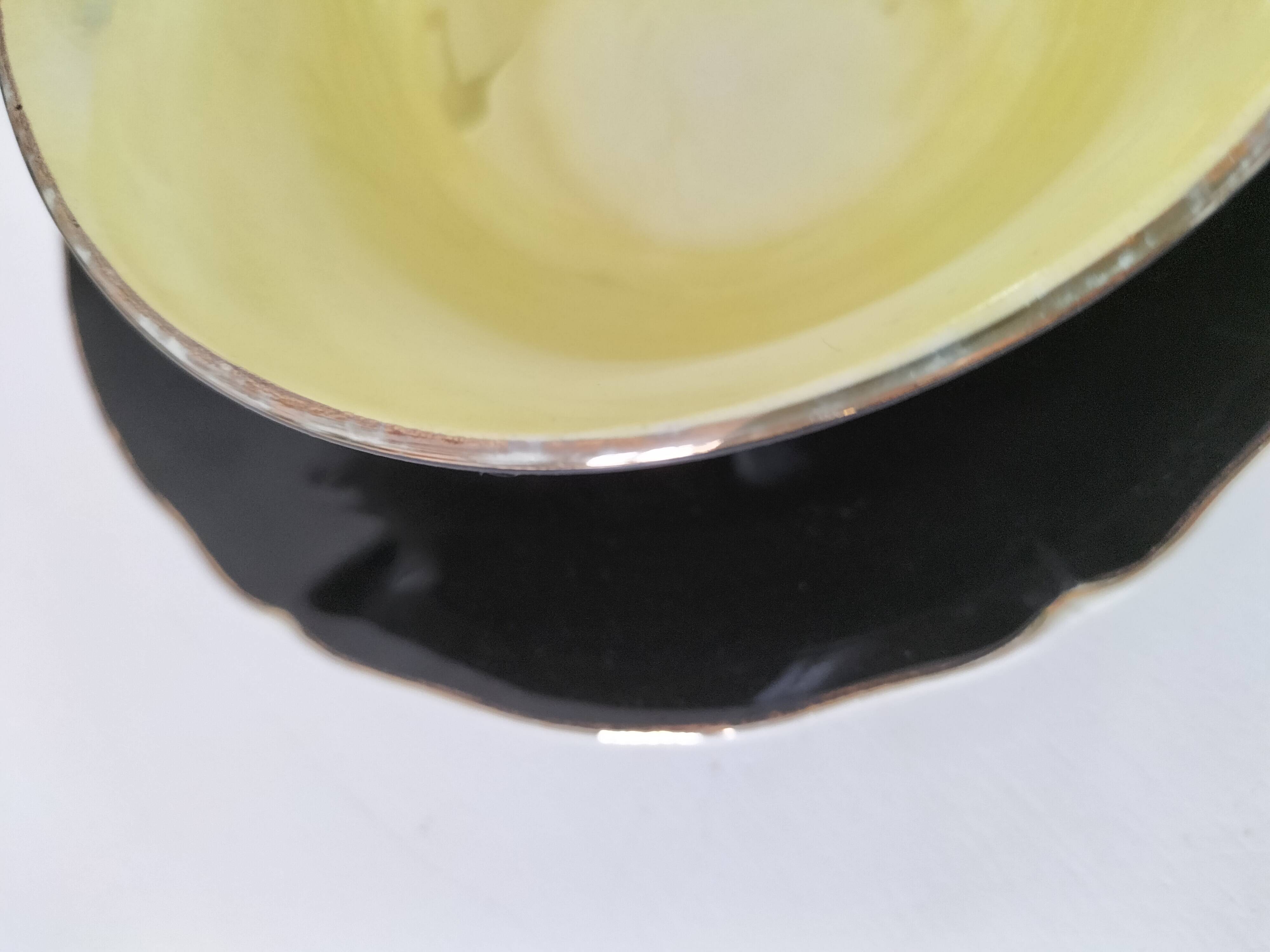 Large black, yellow iridescent and white Art Deco Saint-Amand cup.