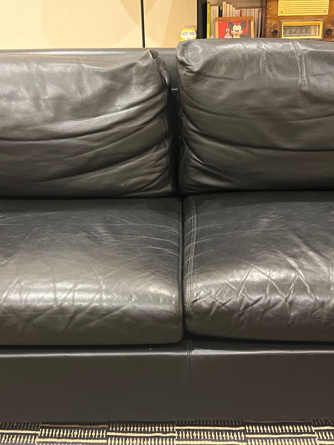 Vintage black leather 2-seater sofa from the 70s by Edelhard Harlis – 180 cm