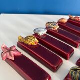 Set of vintage red ceramic knife holders, marine motif, retro style