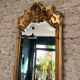 Antique mirror, 238.5/51cm, between two panes, with gilded pediments and gold leaf