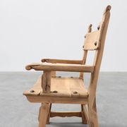Brutalist armchair with carved rosettes and nailed wooden seat, Spain, 20th