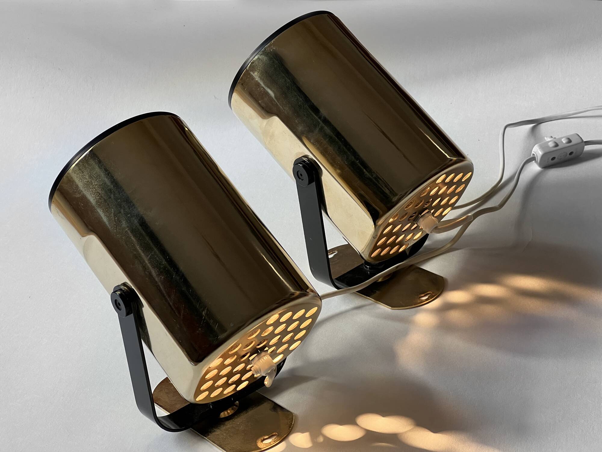 Pair of golden wall lights "Orion" by Per Sundstedt for Kosta Lampan. Sweden 1970s