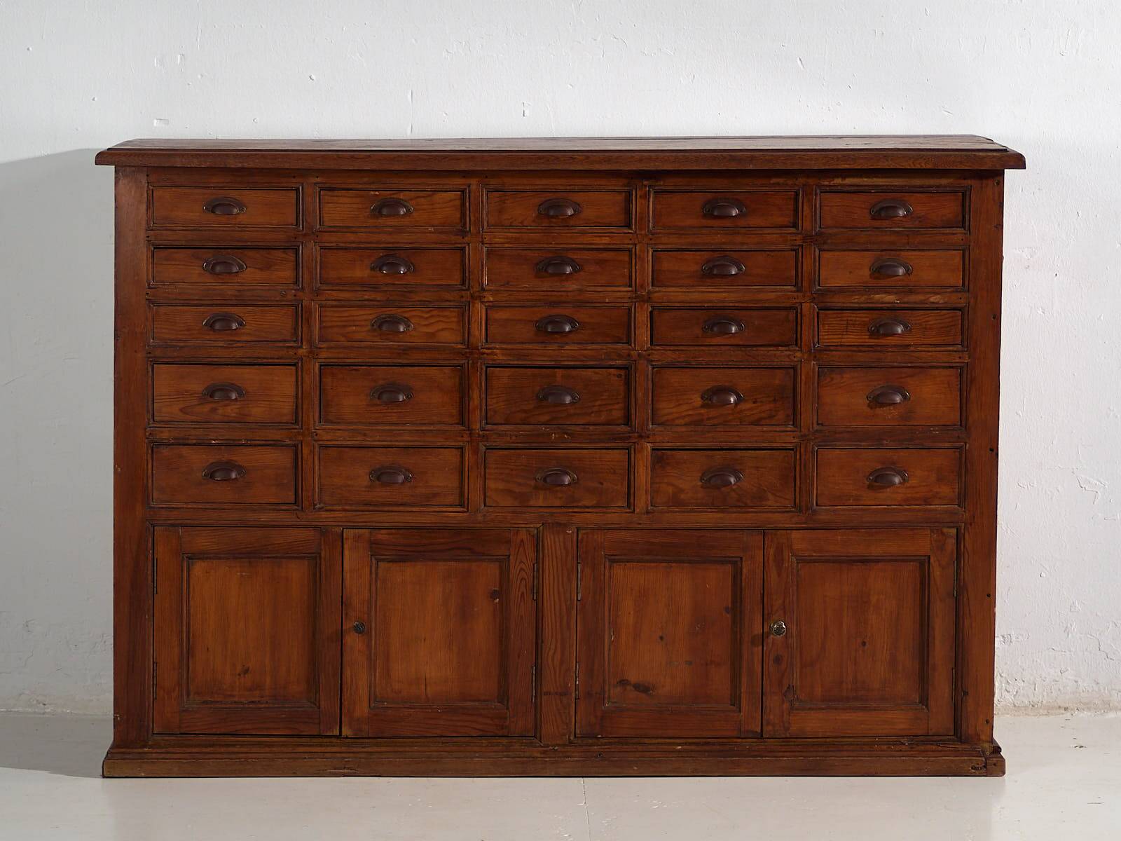 Antique multi-drawer apothecary cabinet (circa 1920)