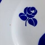 Old mismatched earthenware dinner plates
