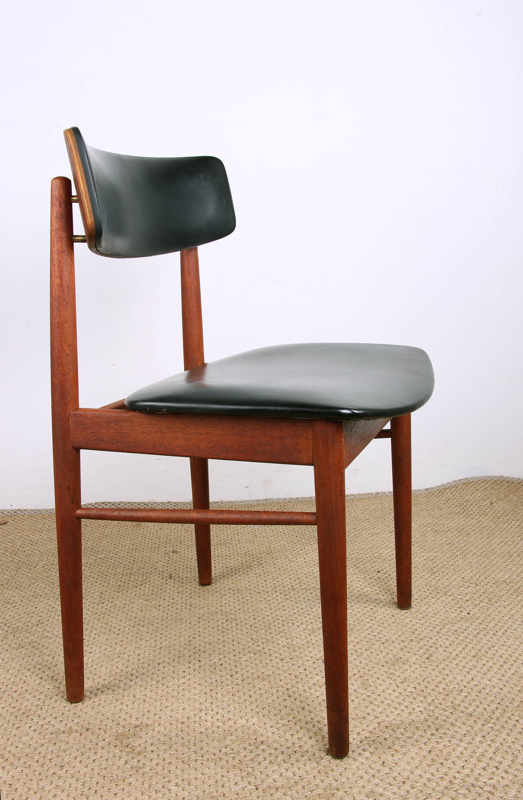 Set of 4 Danish chairs in teak, black skai and brass by Sax 1960.