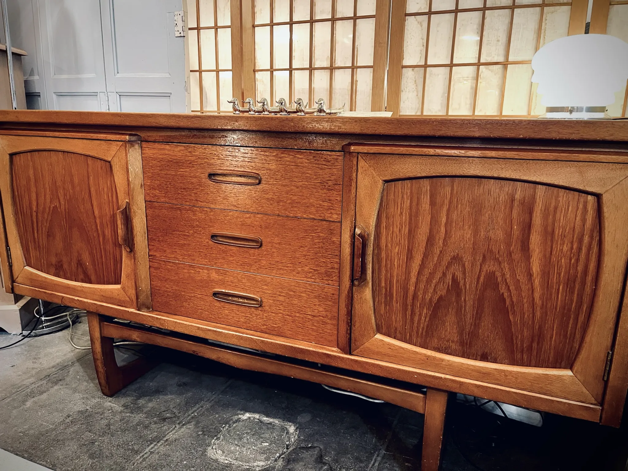 Classic British mid-century teak enfilade, circa 1960s.