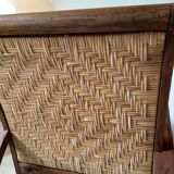 Pair of Art Deco woven rattan armchairs and table