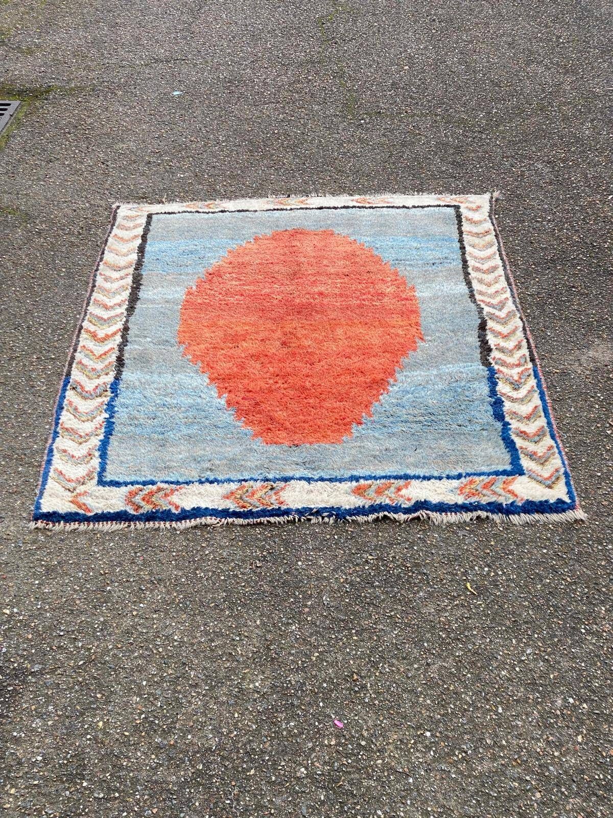 Handmade wool Berber rug with long pile, 110x150cm.