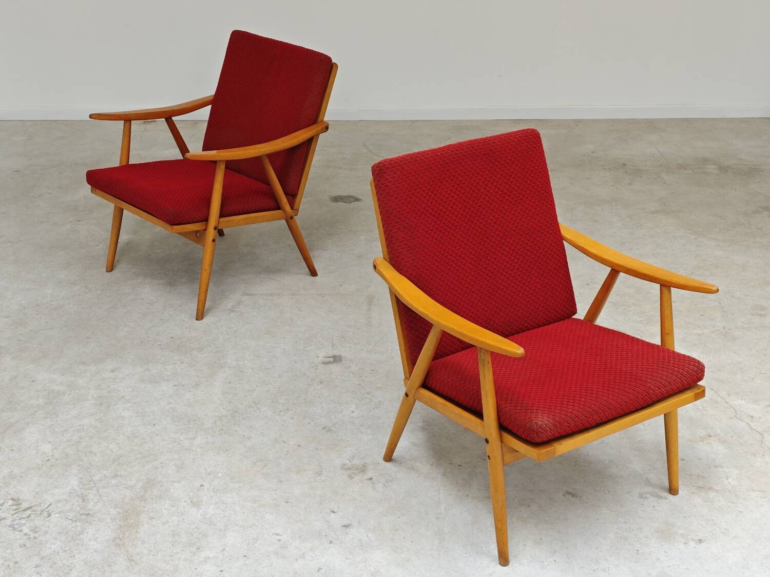 Pair of red Boomerang armchairs by Antonin Suman for Ton Bystrice Thonet