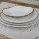 Oval plate in white Swiss porcelain double gilded border "VSK USC Viribus Unitis"