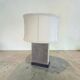 Stainless steel and suede lamp