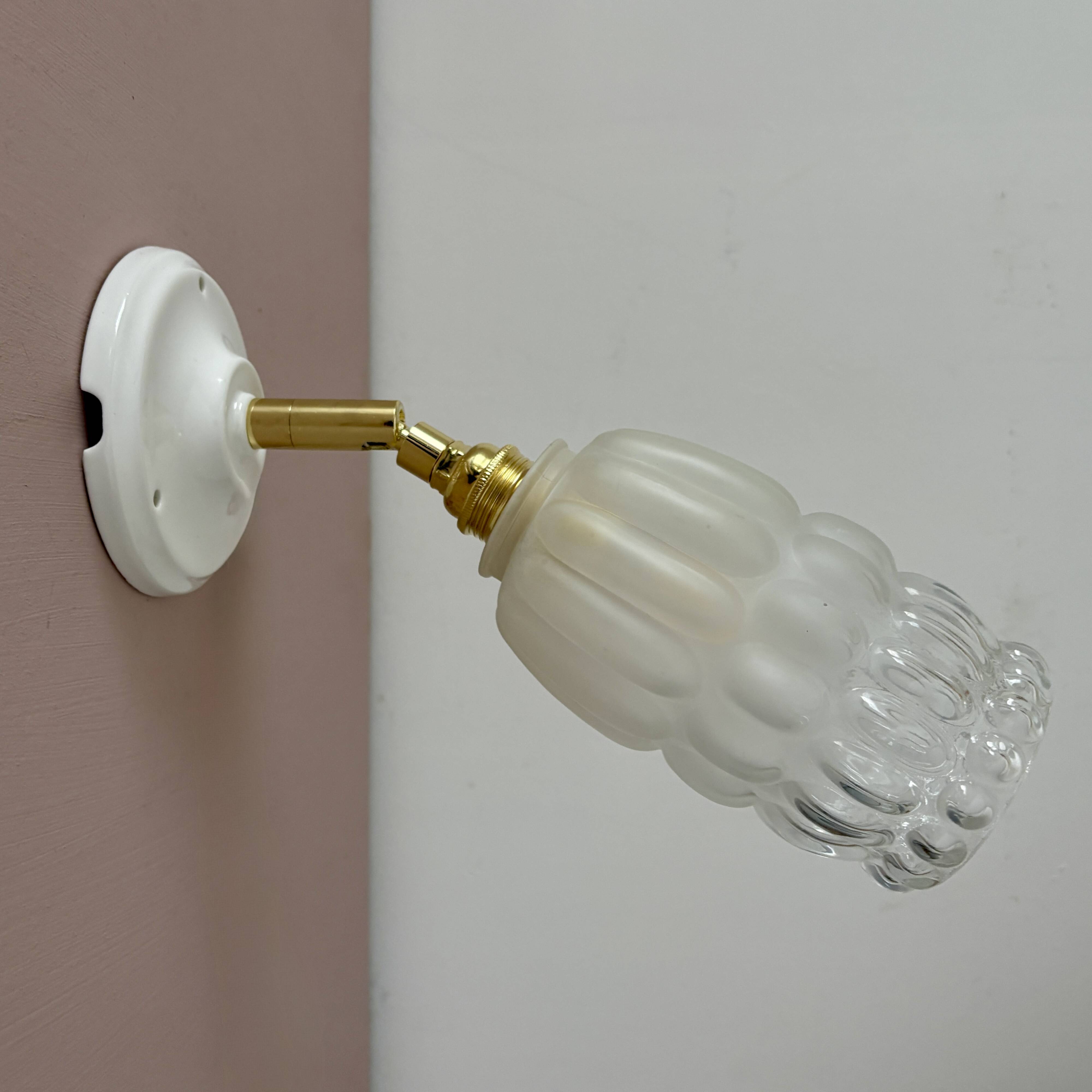 Vintage globe wall lamp in half frosted, half transparent glass