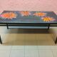 Vintage coffee table ceramic tray decorating orange flowers on grey background