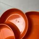 Vintage orange plastic flower dish