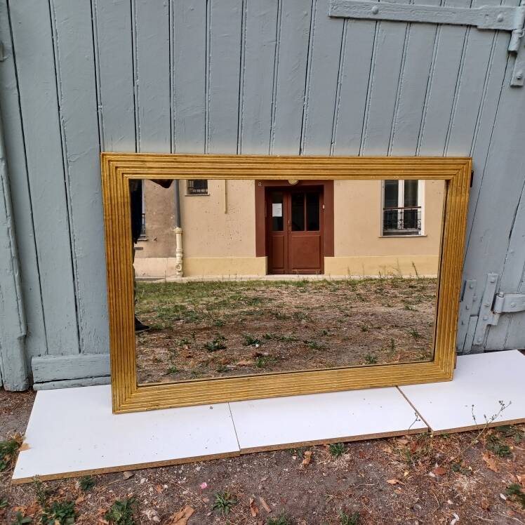 Grand golden mirror from the revolutionary period 110 cm x 74 cm