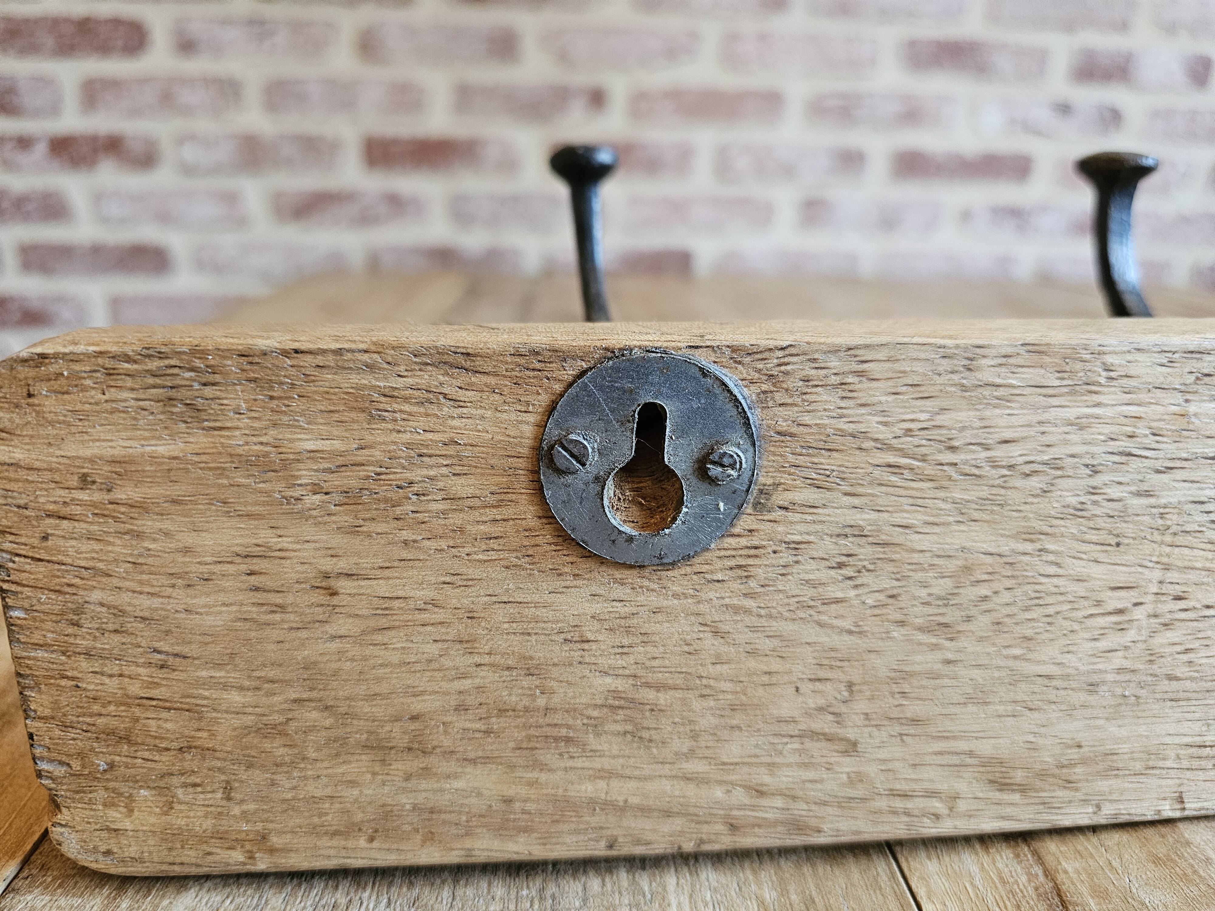 Solid teak coat hook with 4 double cast iron hooks