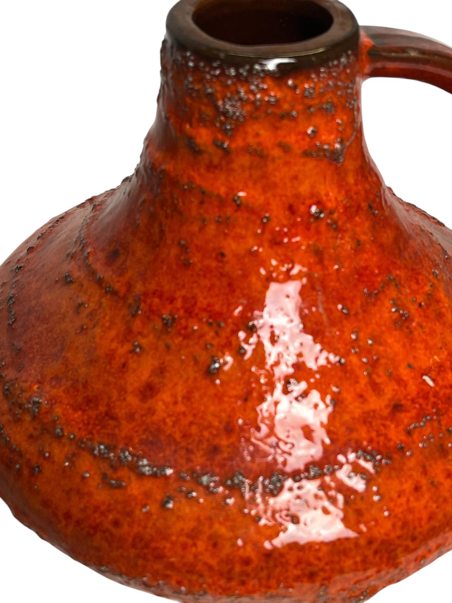 Carstens Workshop, 20th century red ceramic pot with handle