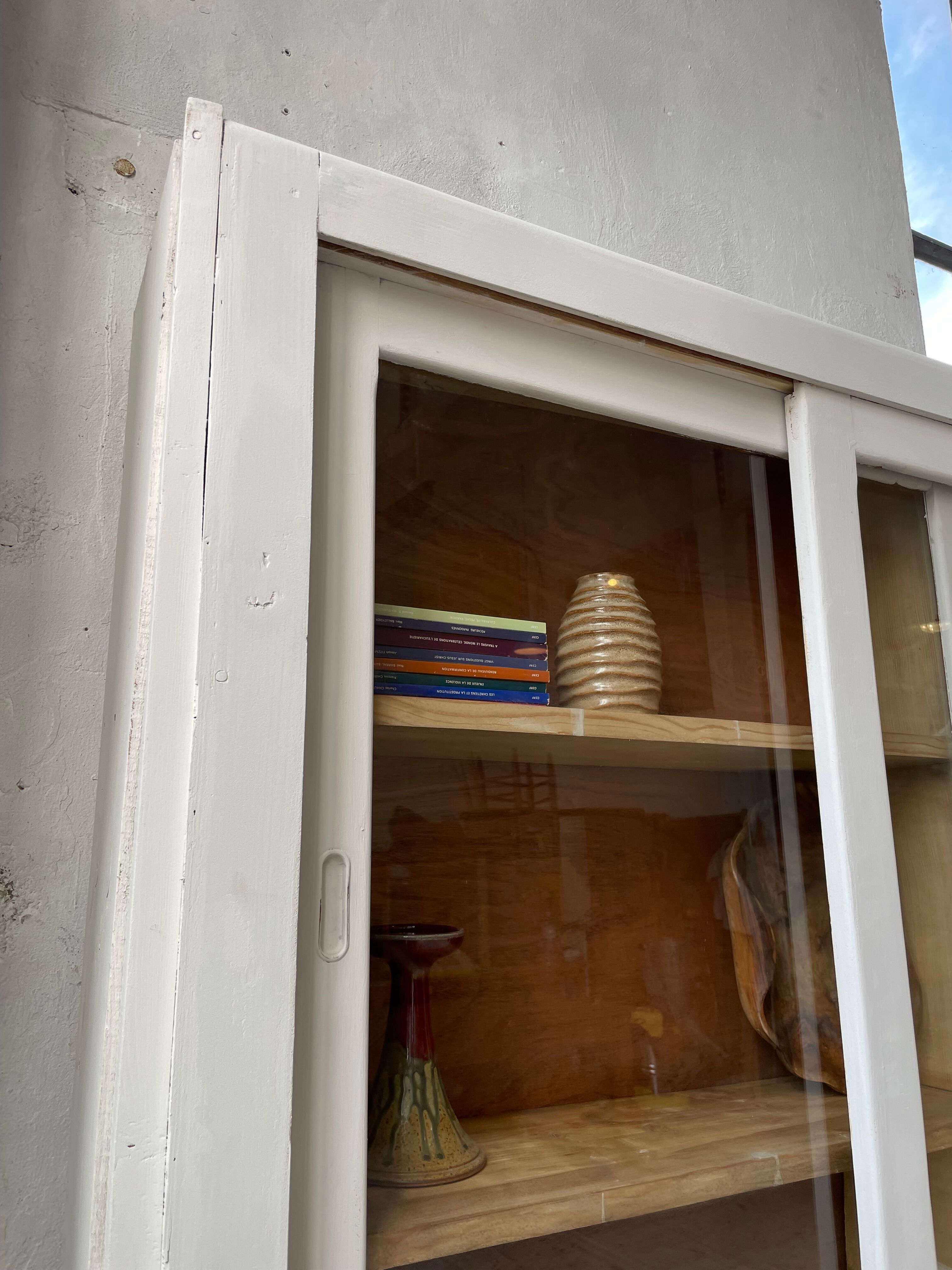 Library showcase ivory white sliding doors