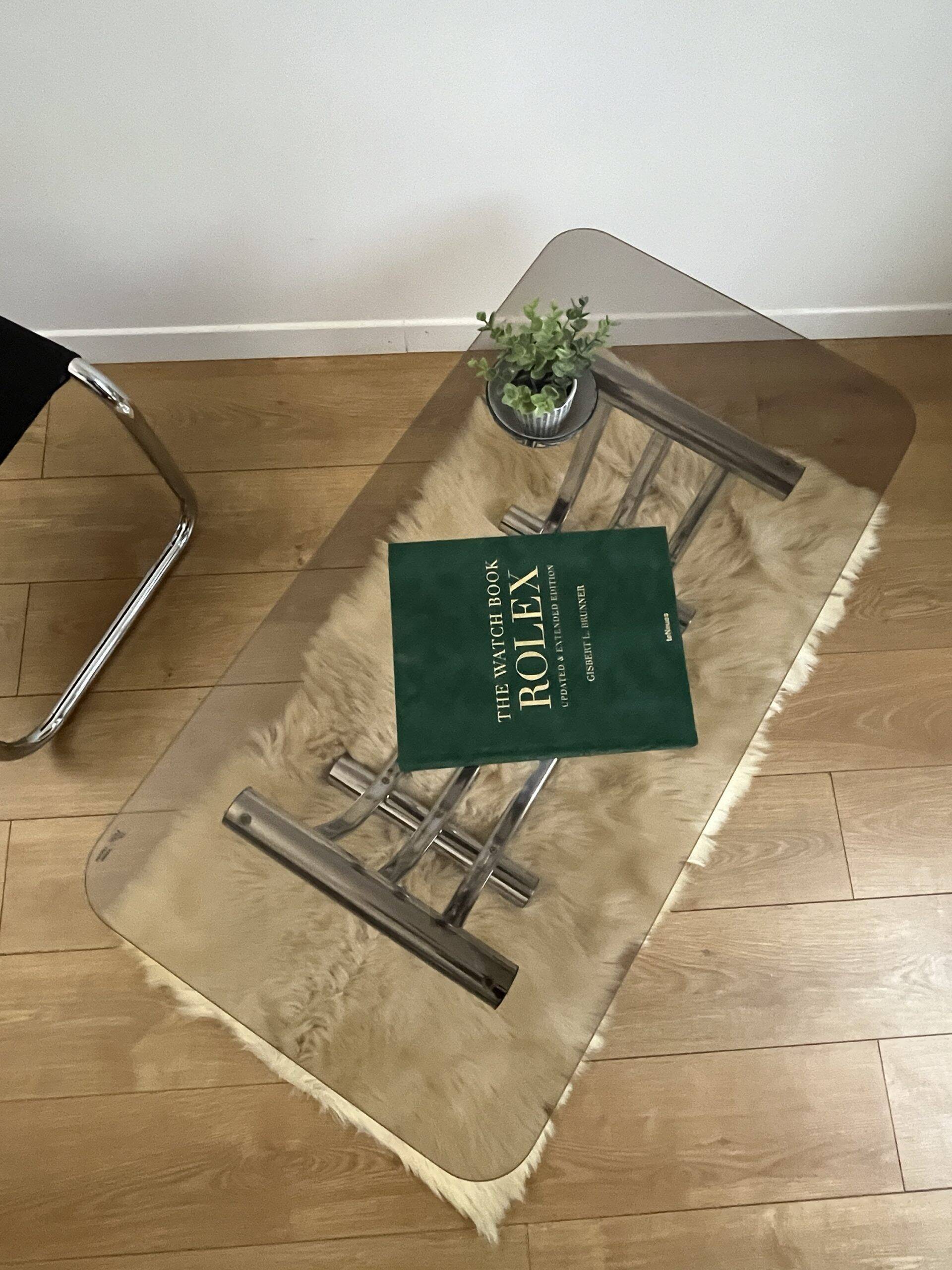 Smoked glass coffee table and chrome base by Yves Boutboul