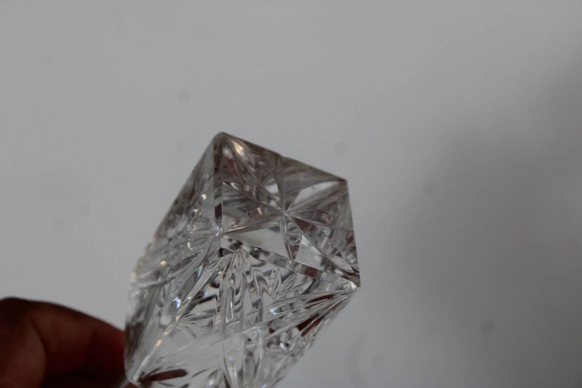Antique cut glass carafe, probably crystal – Geometric patterns and matching stopper.