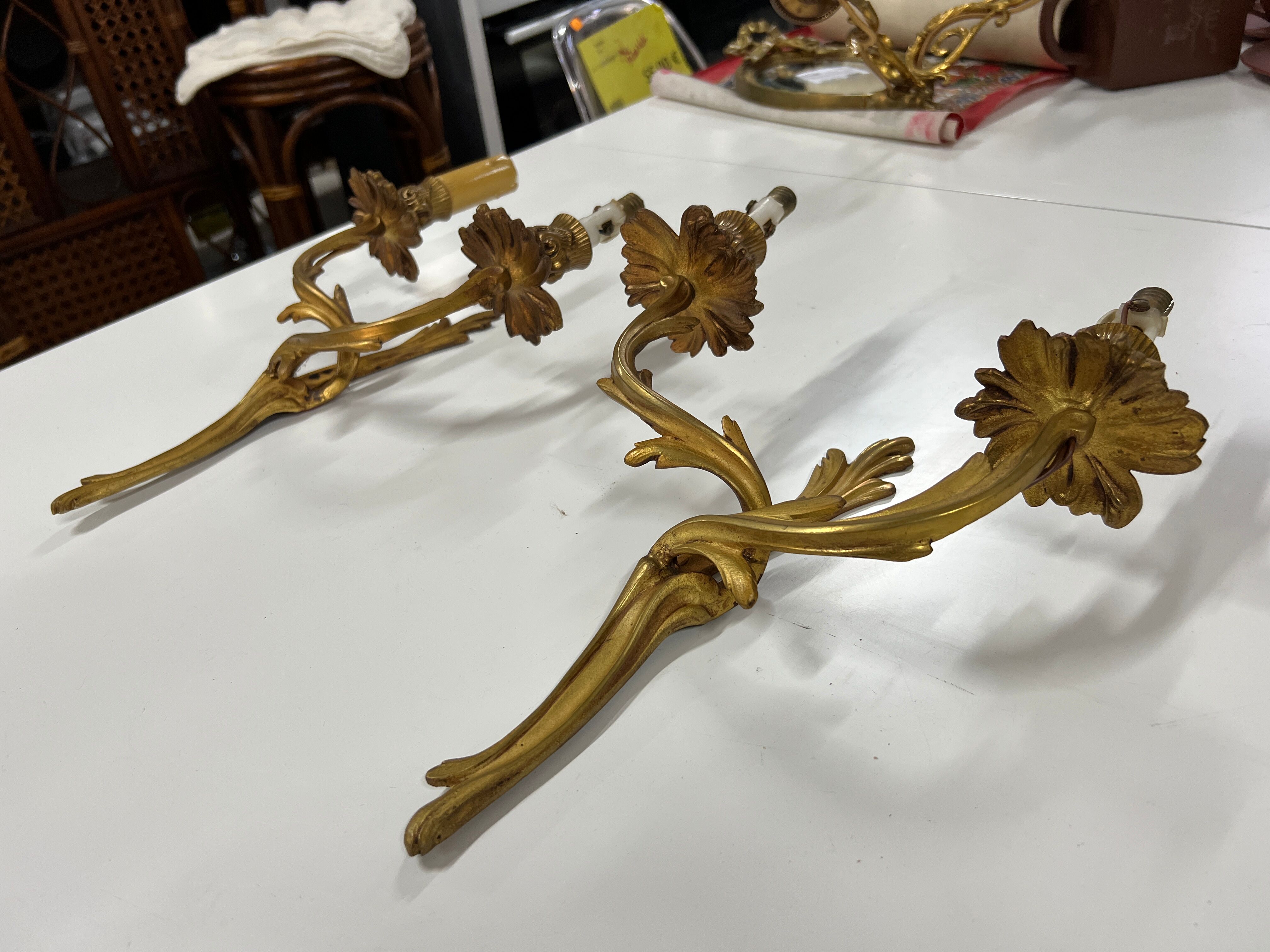 Pair of Louis XV wall lamps in gilded bronze