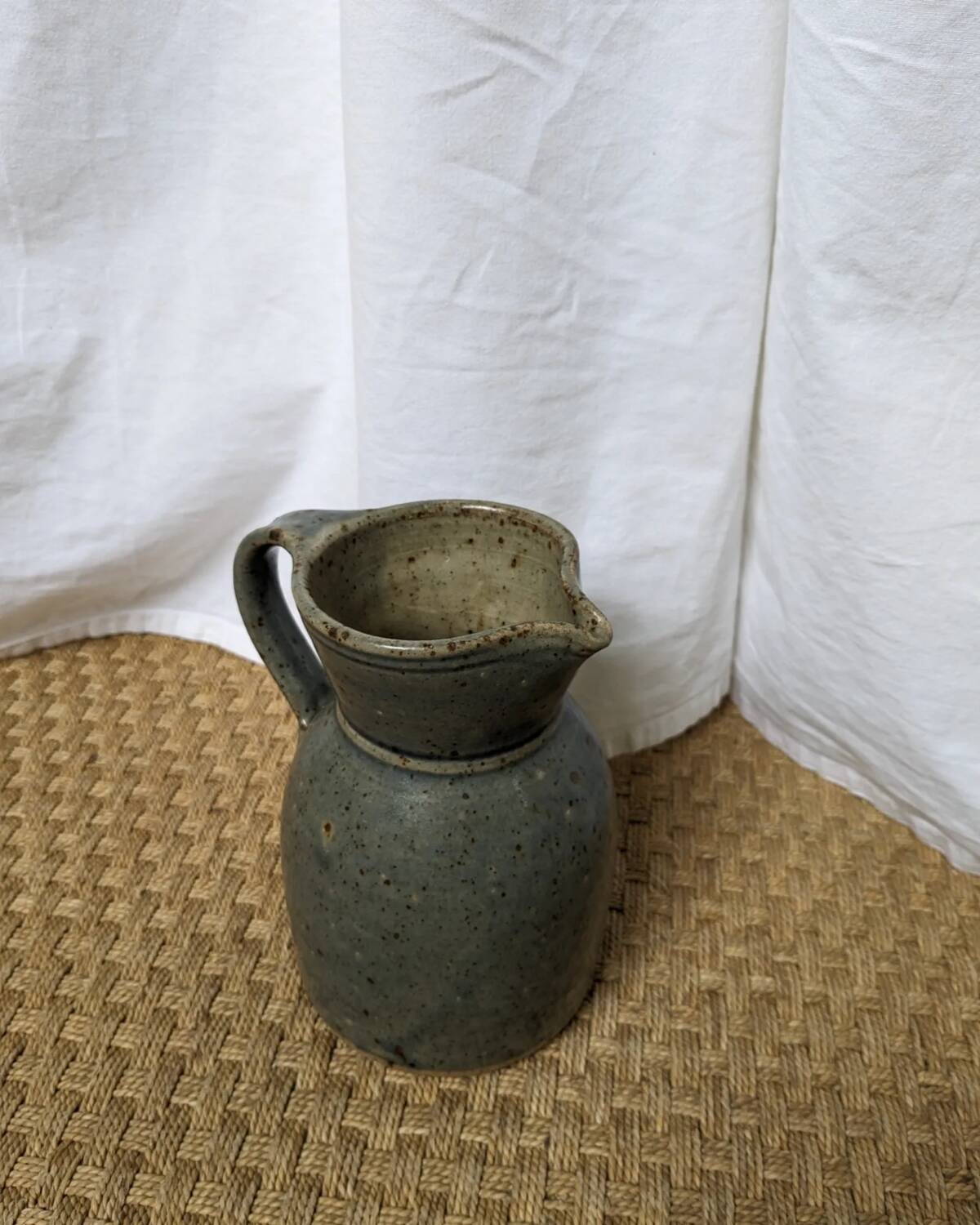 Blue glazed stoneware pitcher