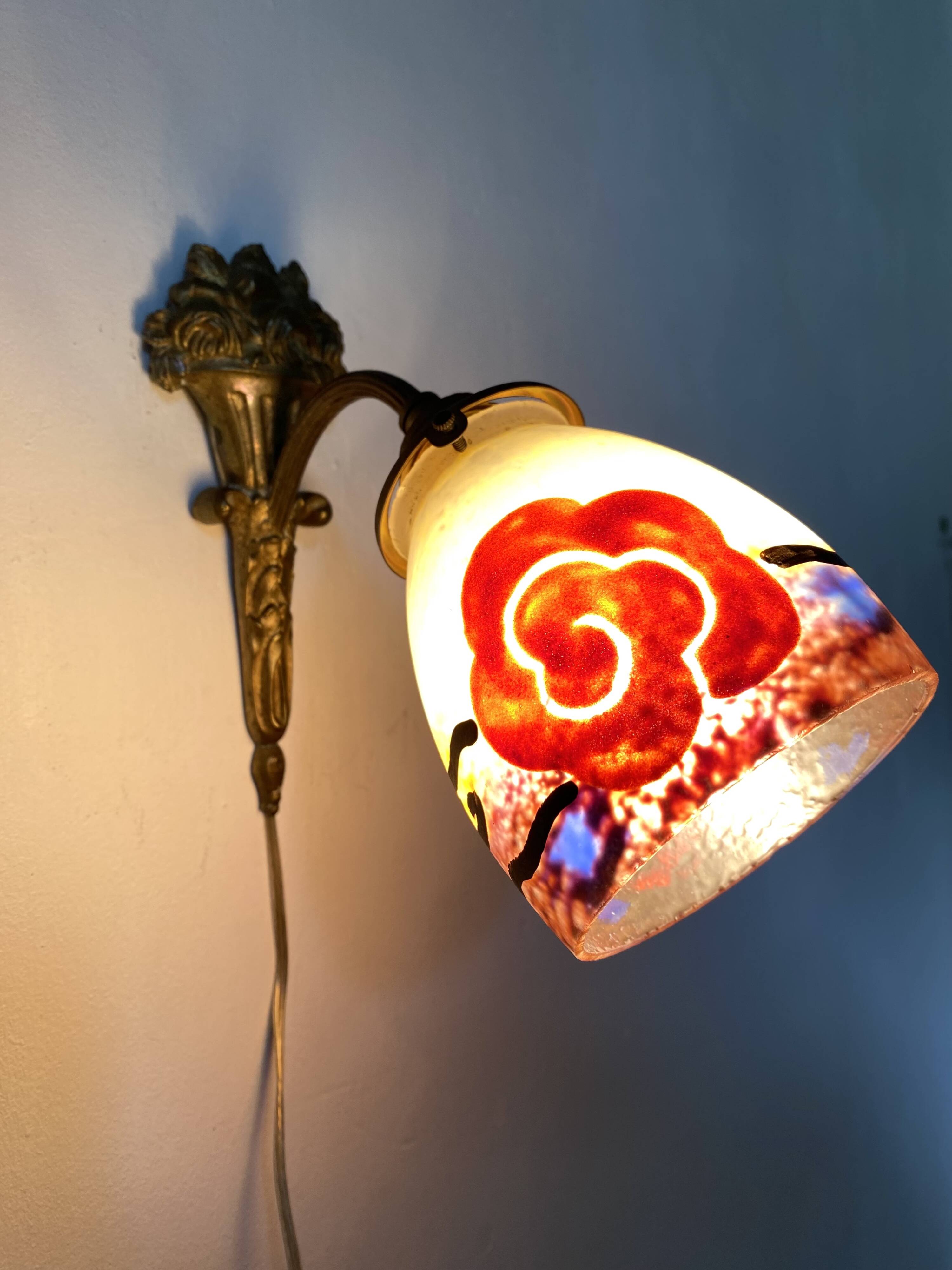 Antique bronze and glass paste wall light