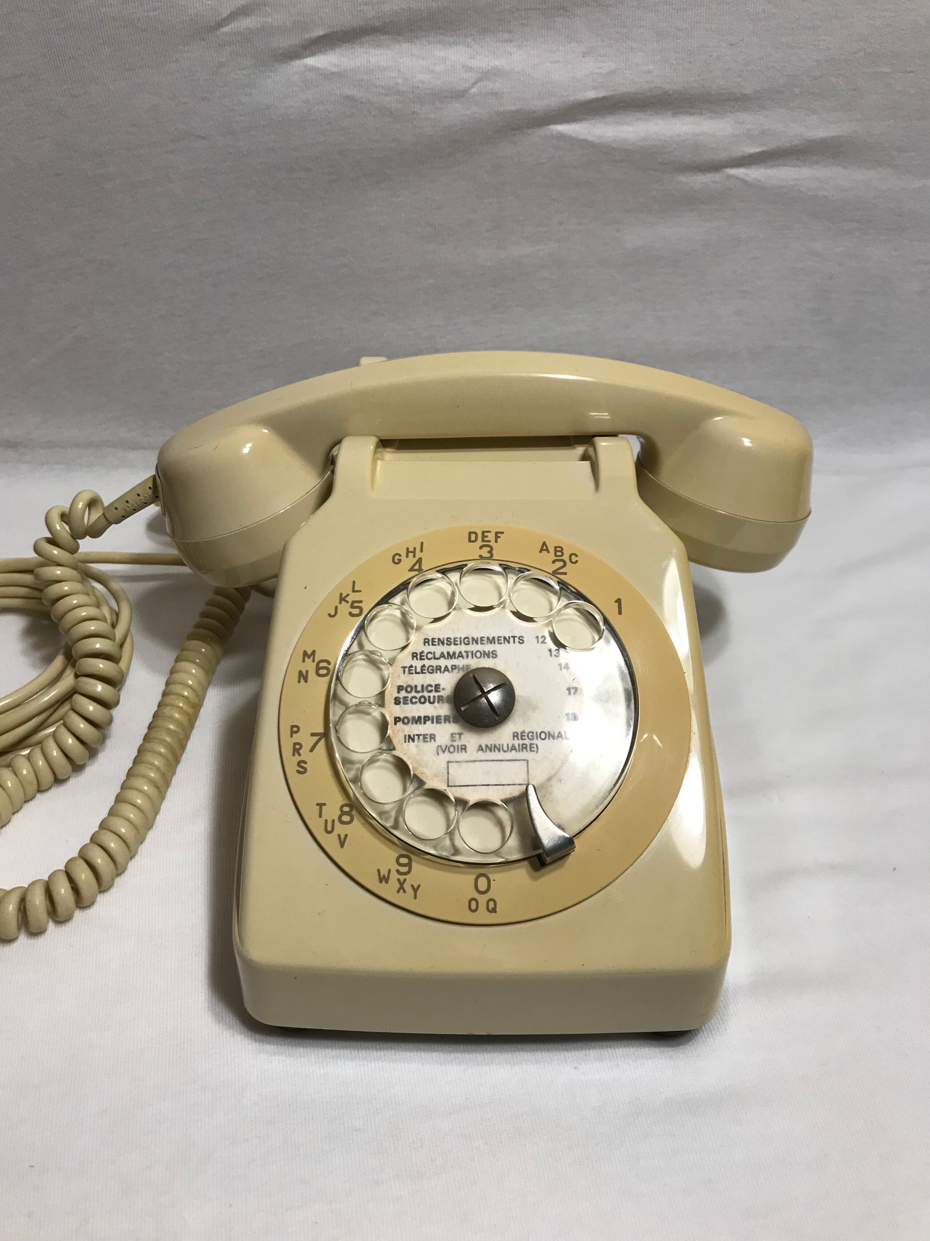 Old white dial phone beige dial, earphone, vintage velvet cover